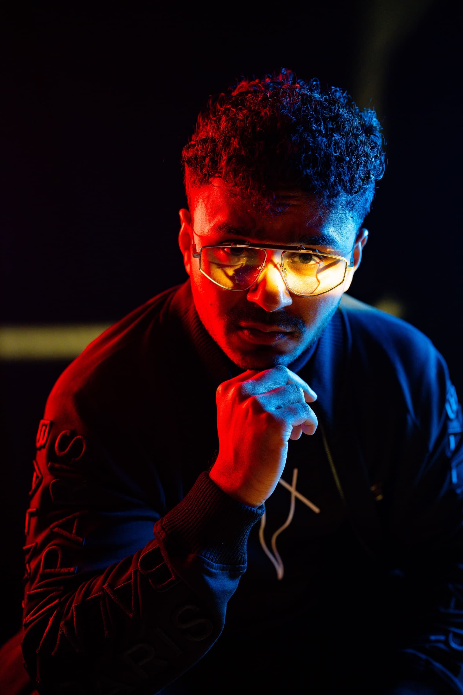 JAXXD red and blue editorial portrait